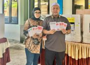 Akhmed Reza dan Istri Nyoblos di TPS 034 Samarinda Utara